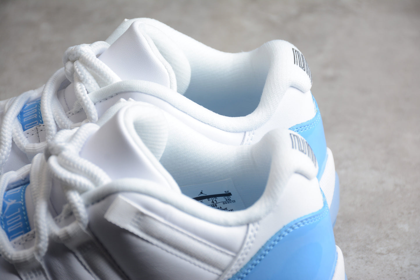 Air Jordan 11 Low  " White & University Blue "