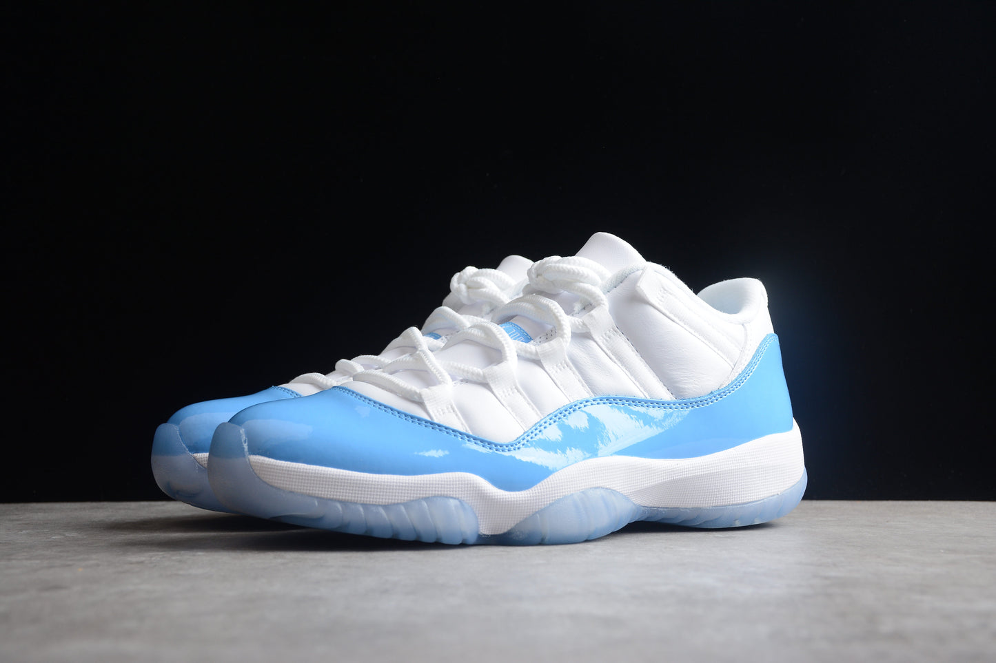 Air Jordan 11 Low  " White & University Blue "