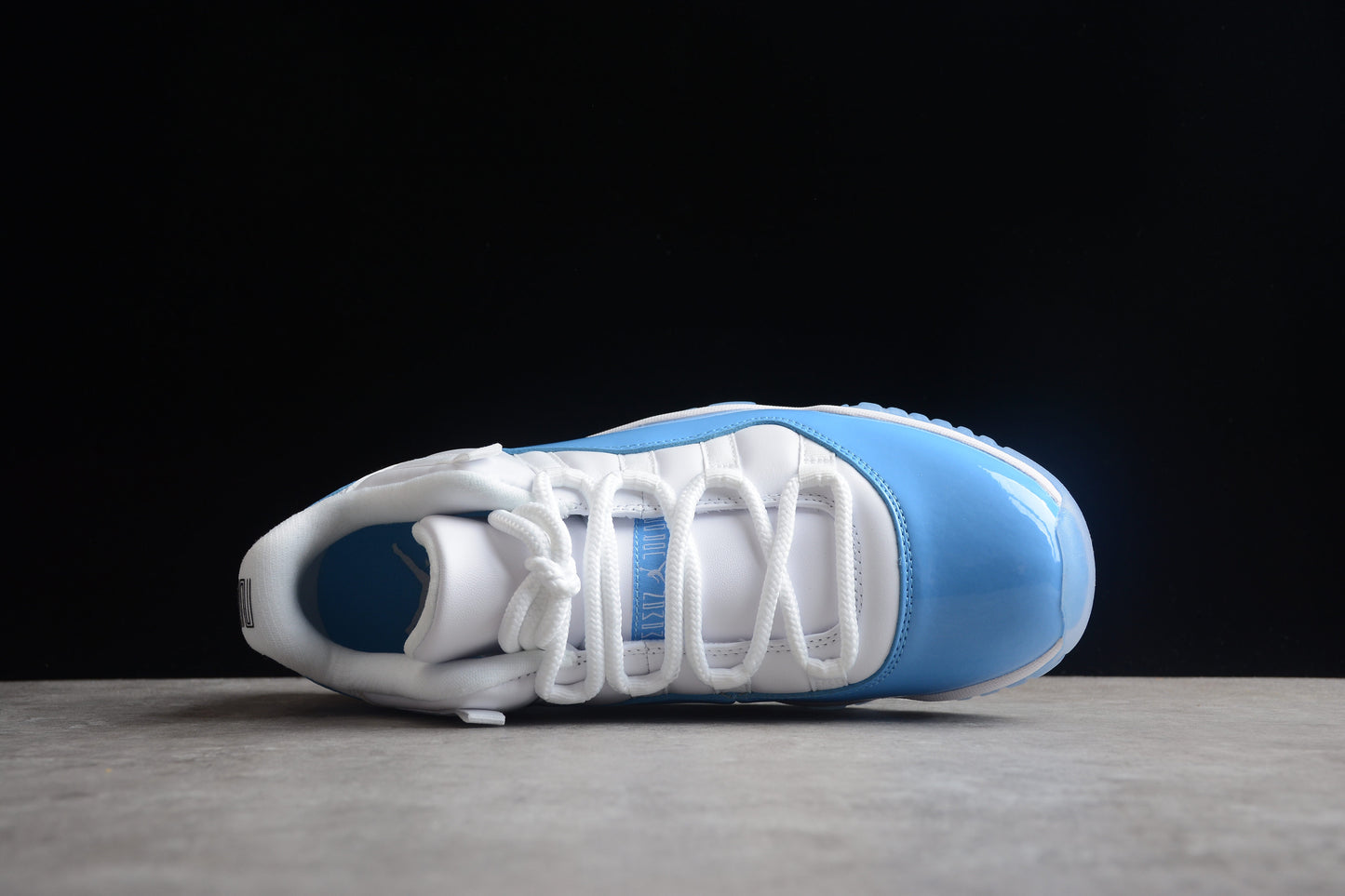 Air Jordan 11 Low  " White & University Blue "