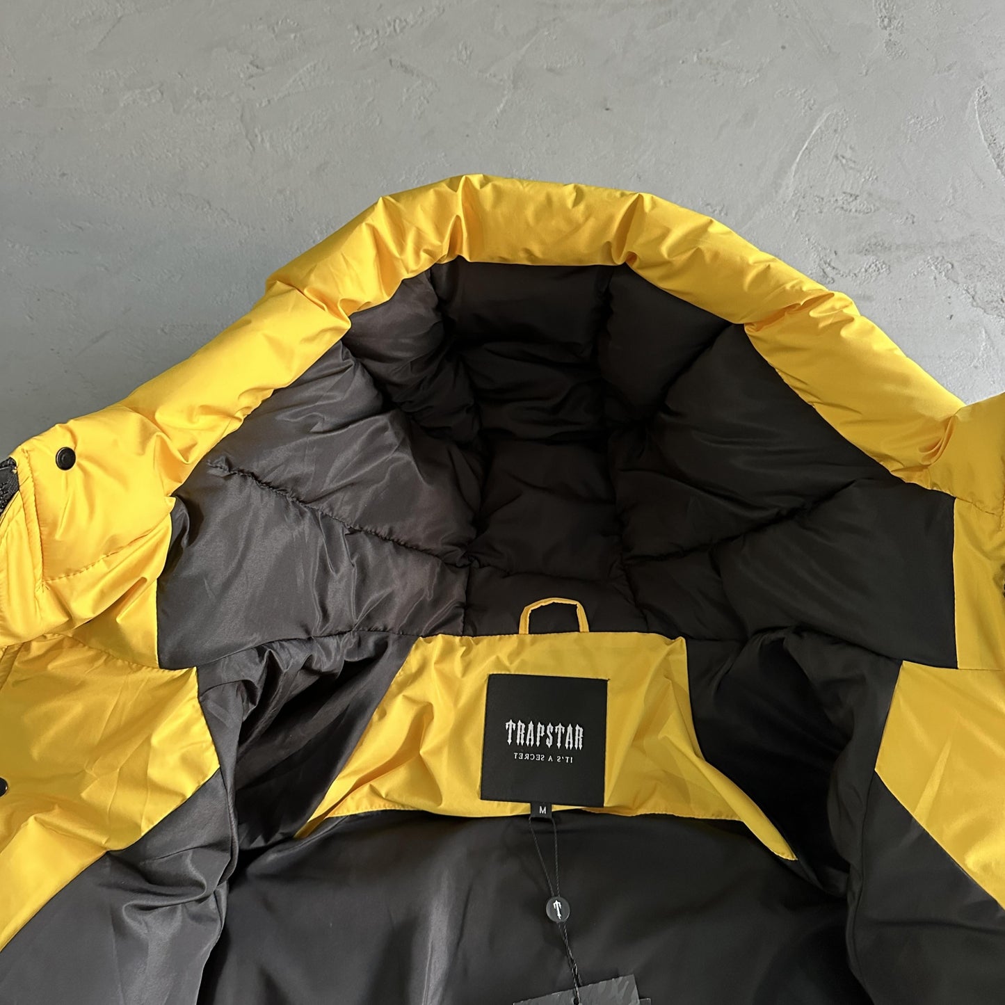 Trapstar Decoded Arch Puffer Jacket Black Yellow